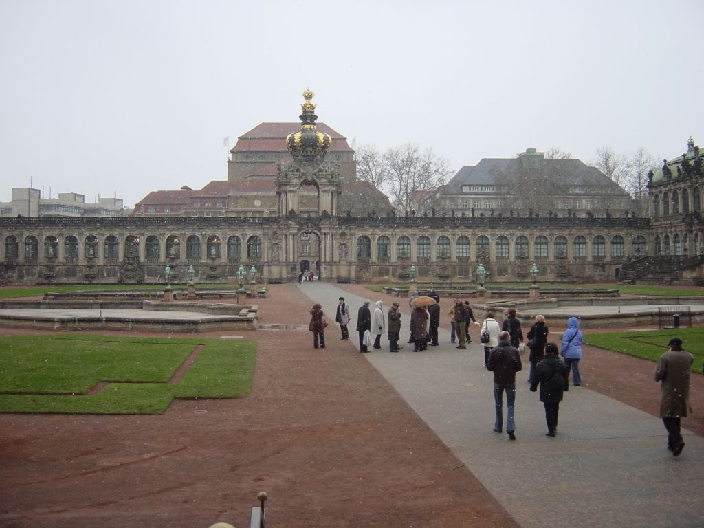 

The Zwinger was built for some king to get married in, but it didn't end up 
happening there.  Anyway, the crown is the crown of the king that was supposed
to get married.

