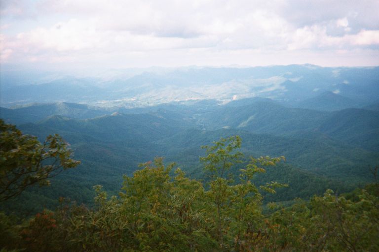 
From the top of Albert Mountain.  The book calls the approach ``steep, rocky, and memorable''.  You can see the weather coming in.

