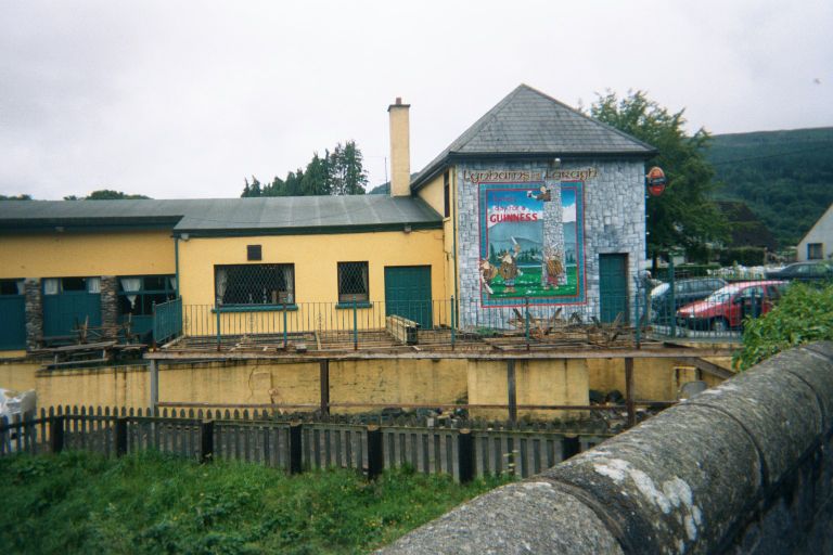 
A piece of Guinness art in Glendaloch.  The big tower is part of the 
ancient monestary in Glendaloch.
